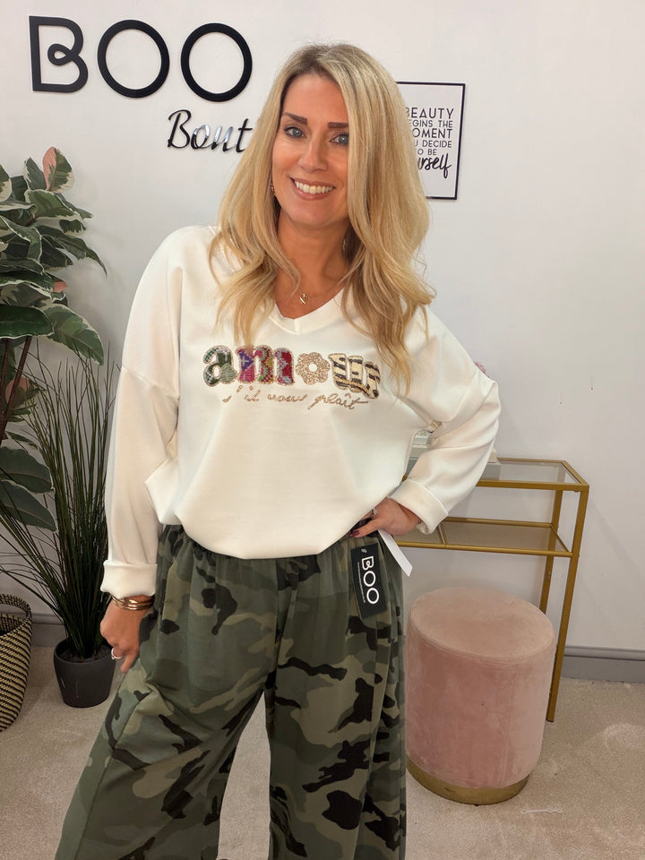 The PEONY white scuba sweatshirt top