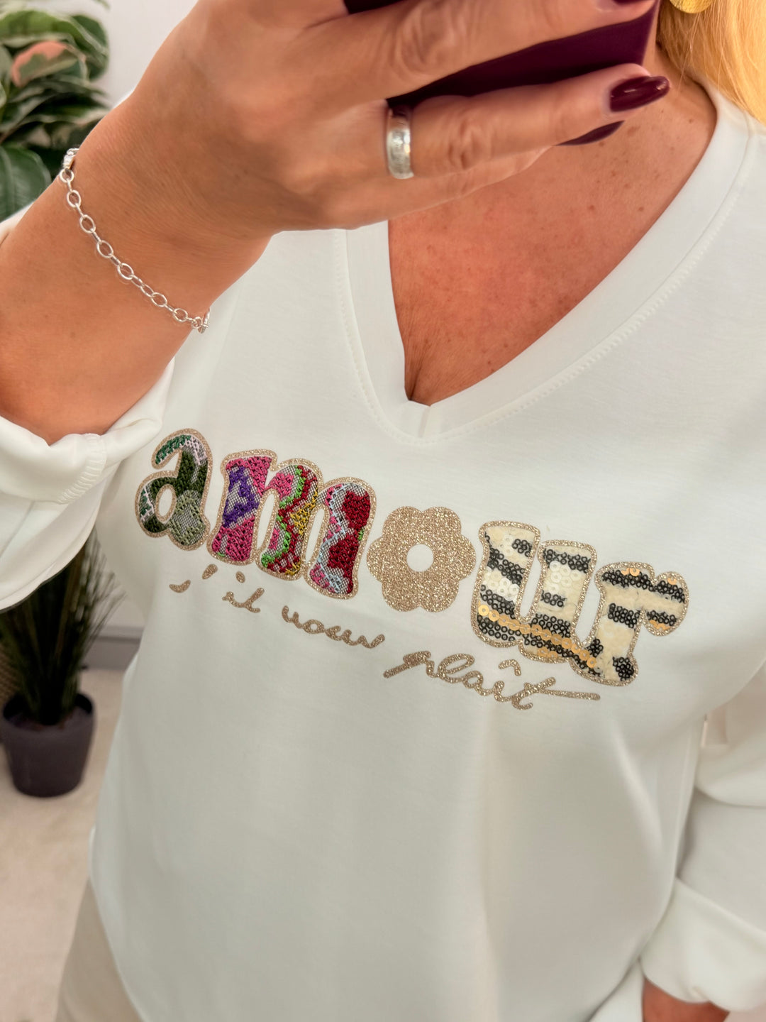 The PEONY white scuba sweatshirt top