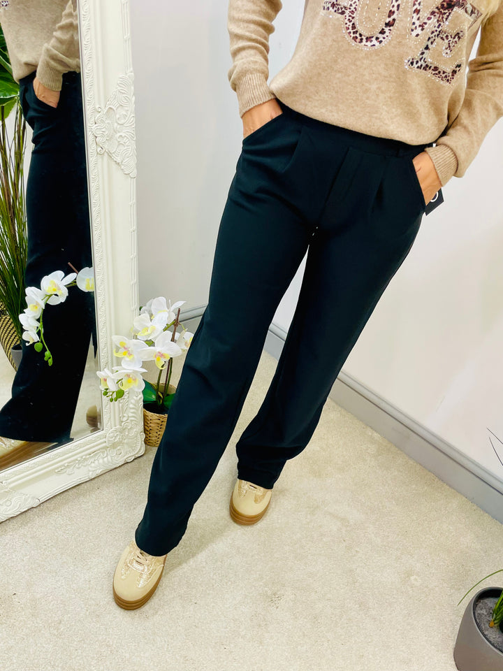 The DITA black trousers
