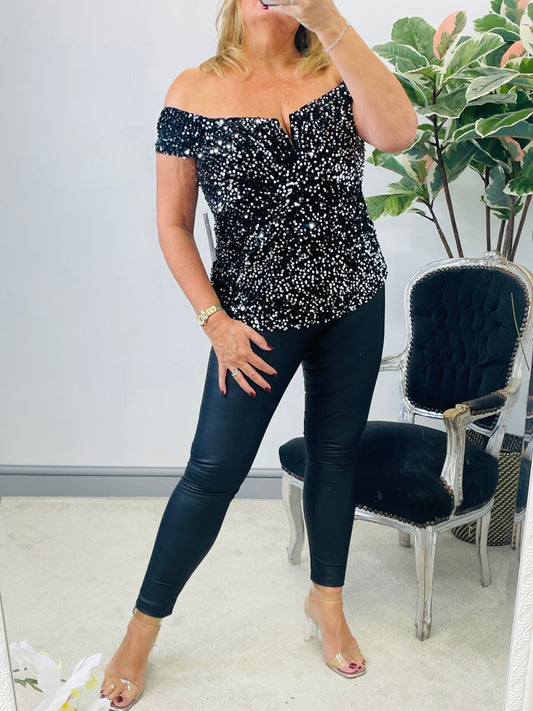 The MONICA black/silver sequin off the shoulder top