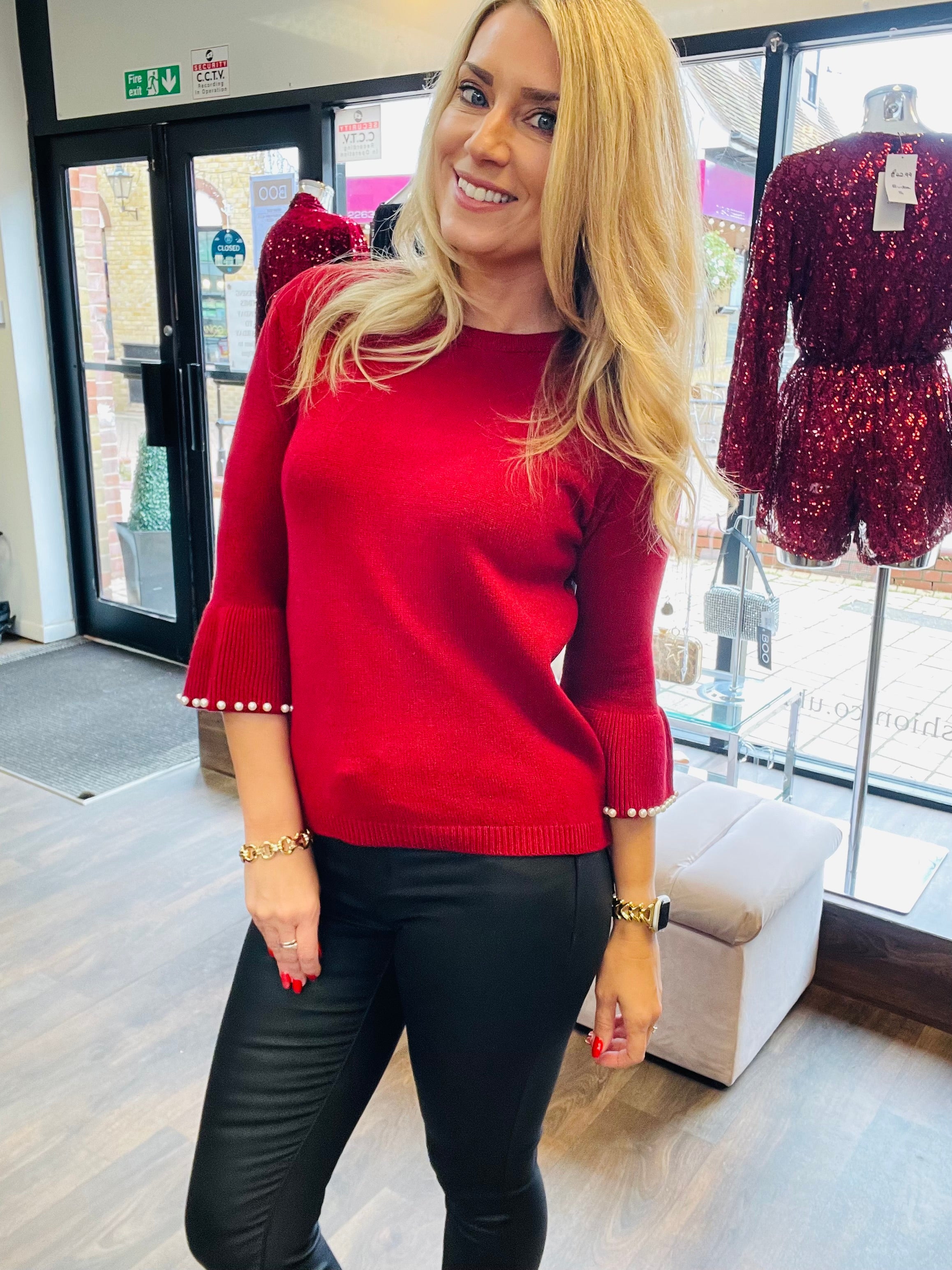 Red jumper black jeans clearance