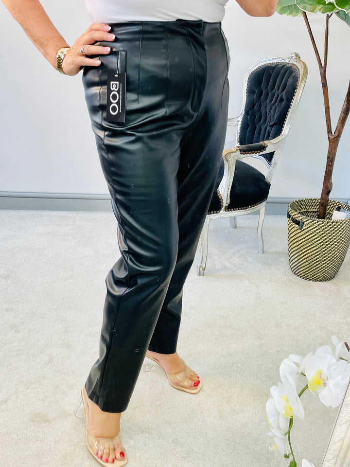The MADDIE black pleather trousers