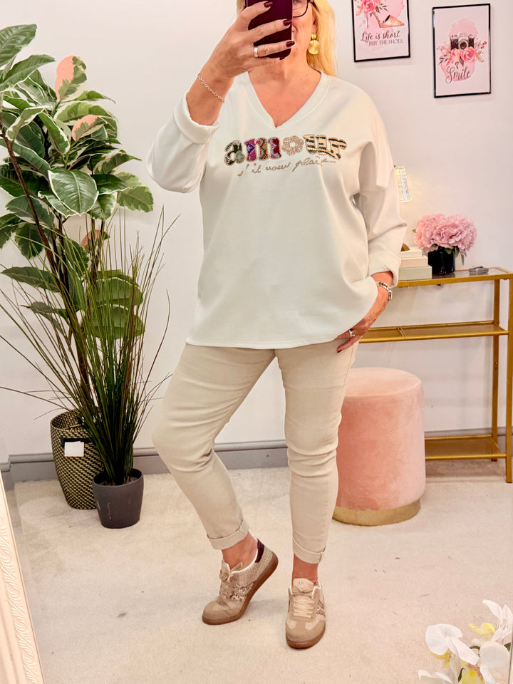 The PEONY white scuba sweatshirt top